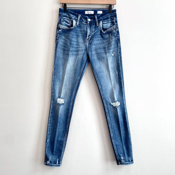 Distressed Mid Rise Skinny Jeans