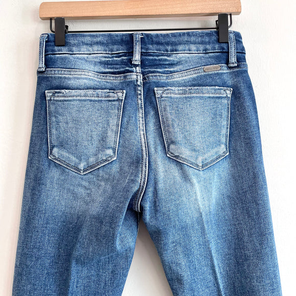 Distressed Mid Rise Skinny Jeans