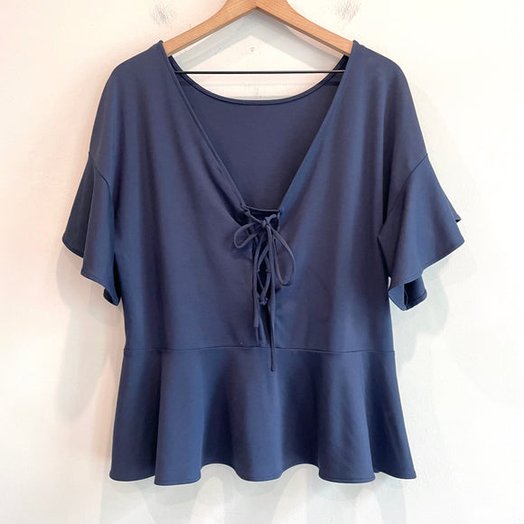 Lace Up Back Peplum Top