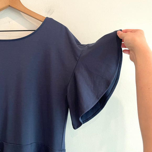 Lace Up Back Peplum Top