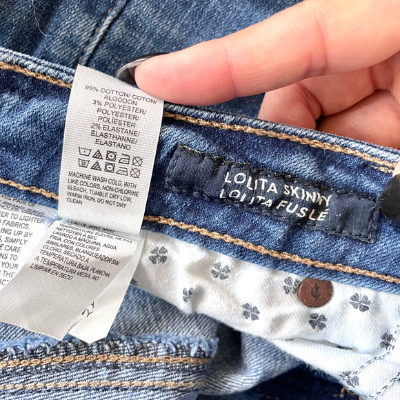 Distressed Skinny Jeans